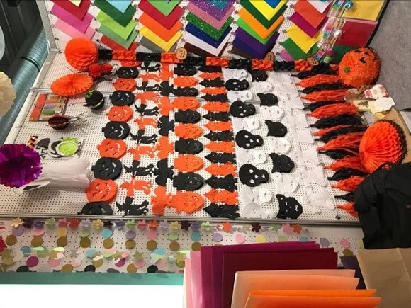 Coordinated paper decorations arranged in a colorful product display